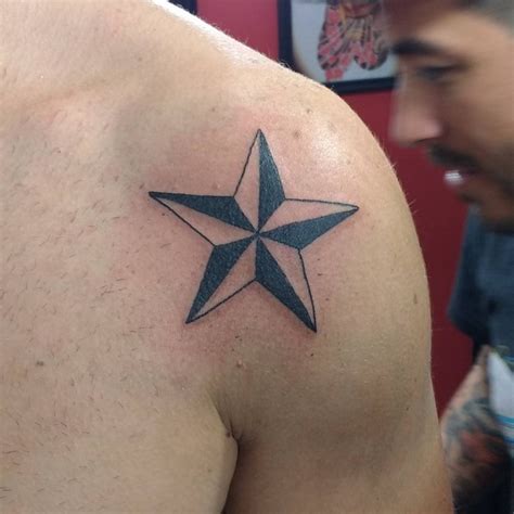 star tattoo on shoulder meaning|Stunning Star Shoulder Tattoos: Designs, Meanings, And Care Tips